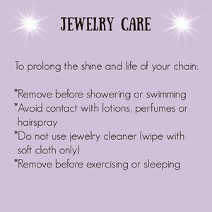 May include: A purple background with white text that reads "JEWELRY CARE" and provides instructions on how to care for jewelry. The text reads: "To prolong the shine and life of your chain: *Remove before showering or swimming *Avoid contact with lotions, perfumes or hairspray *Do not use jewelry cleaner (wipe with soft cloth only) *Remove before exercising or sleeping"