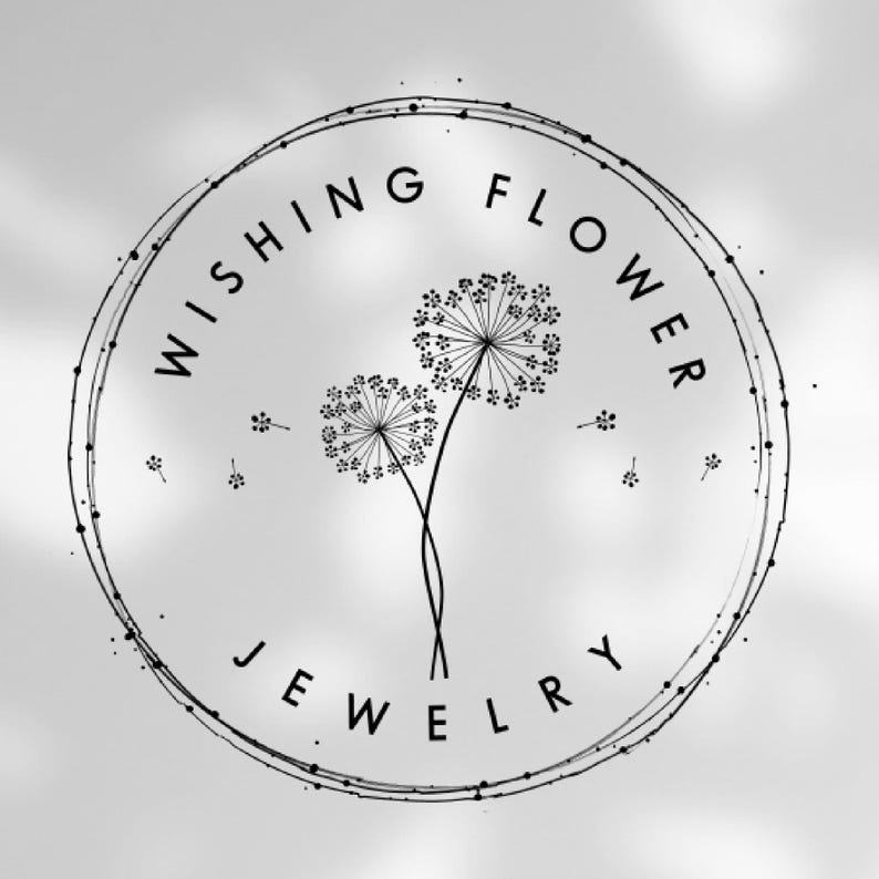 May include: A black and white logo for "Wishing Flower Jewelry" featuring a circular design. The design includes two dandelion-like flowers with delicate stems and the brand name encircling the flowers.