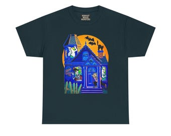 May include: Dark teal t-shirt with a cartoon haunted house design. The blue house has orange accents, a yellow moon, and bats. The text "MIDNIGHT MOVIE MONSTERS" is at the top. The design includes ghosts and a black cat on the chimney.