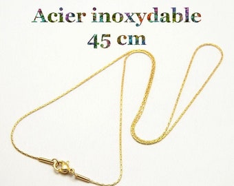 1 collier en fines mailles torsion acier inoxydable doré 45 cm