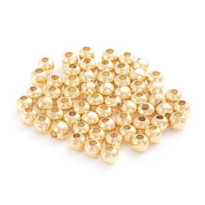100 perles de 3 mm dorées en acier inoxydable image 2