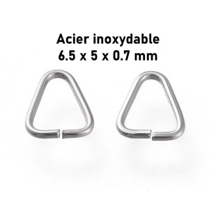 Peut inclure: Deux anneaux de saut triangulaires argentés, 6,5 x 5 x 0,7 mm, en acier inoxydable. Acier inoxydable.