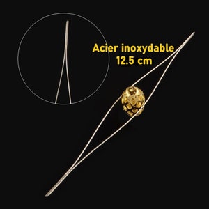 Peut inclure: Une paire d'aiguilles à perles en acier inoxydable de 12,5 cm avec une perle dorée au centre.