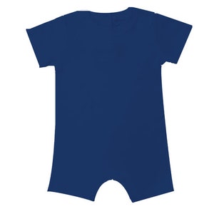 May include: A solid navy blue short-sleeved bodysuit.