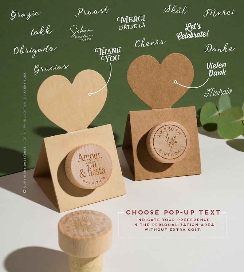 May include: Wooden wine stoppers with personalized text options, displayed with heart-shaped cards. One stopper is engraved with "Amour, vin & fiesta 07.06.2026", and another with "LIZ.S 50 TH BIRTHDAY". The image includes text options like "Thank You" and "Cheers".