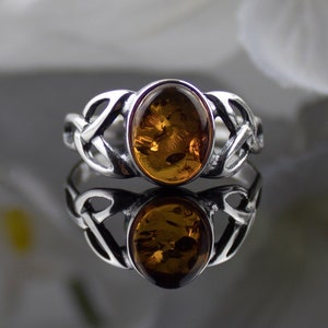 Green amber celtic ring cheap