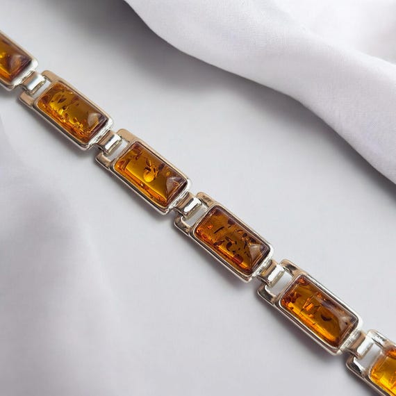 Amber Jewelry Shop Bracciale in ambra naturale su elastico 19 cm - 100% ambra baltica non lucidata - bracciali in ambra - perle di oliva in vera ambra