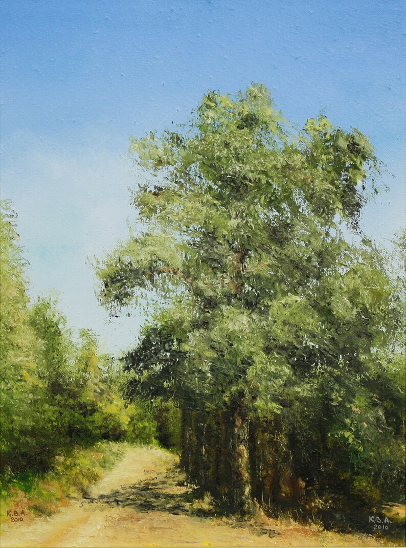 May include: Oil painting of a sunlit path winding through a forest. The artwork features a large tree with lush green foliage, a blue sky, and a dirt path. The artist's signature and the year 2010 are visible in the lower corners.