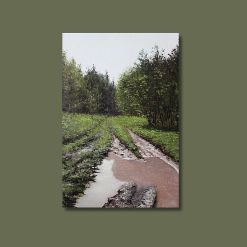 May include: An oil painting depicts a muddy dirt road winding through a lush green forest. The road is marked by tire tracks and a large puddle of reddish-brown water. Trees line both sides of the path, with a cloudy sky overhead.