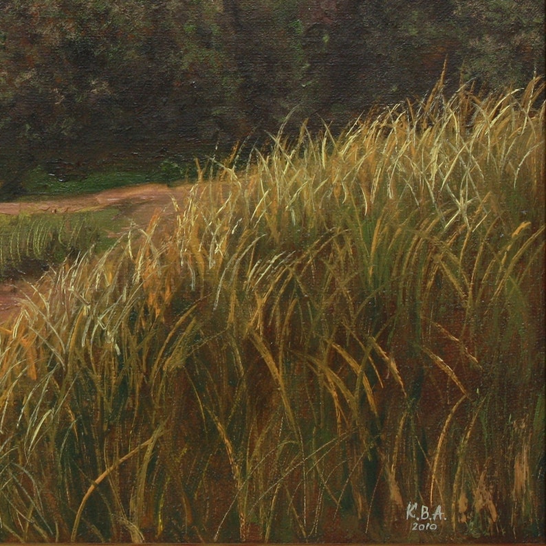 May include: An oil painting depicting a field of tall, golden grasses, with a dirt track in the background. The artwork uses a warm colour palette of greens, browns, and yellows. Signed "K.B.A. 2010" in the lower right corner.