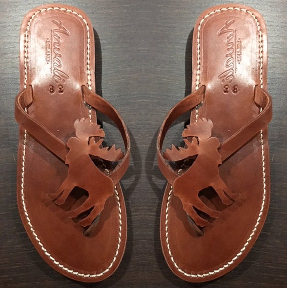 animal leather flip flops