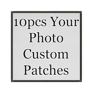 May include: A square-shaped patch with a light gray textured fabric background and a dark border. The text 10pcs Your Photo Custom Patches is printed in black, bold, serif font across the center of the patch, occupying most of the surface area.
