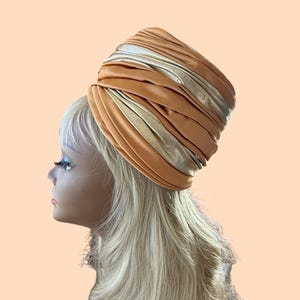 May include: A white ceramic mug with a black handle and the text "But First, Coffee" in a black, bold font. The mug is sitting on a white surface. The mug appears to be 12 ounces.