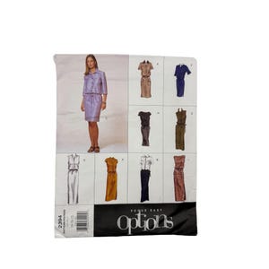 May include: A sewing pattern package featuring a woman in a lavender dress. The package includes multiple dress designs, with the text "Vogue Easy Options" and the pattern number "2394".
