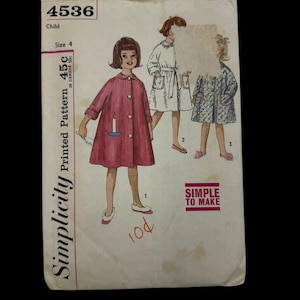May include: Vintage Simplicity printed pattern for a child's size 4 coat. The cover features illustrations of children wearing the coat in different colors and styles. The pattern number is 4536.