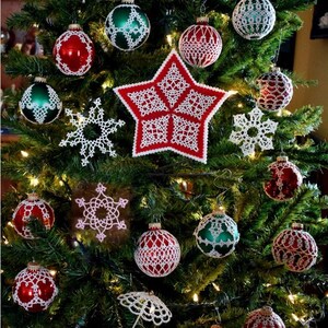May include: A Christmas tree decorated with white crocheted ornaments, including snowflakes, a star, and a few round ornaments. There are also some red and green glass ornaments on the tree.