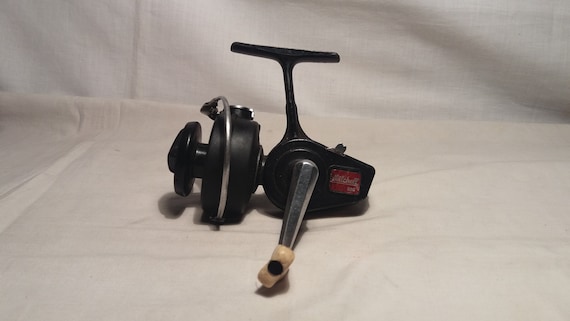 Vintage MITCHELL 320 Spinning Spin Fishing Reel 