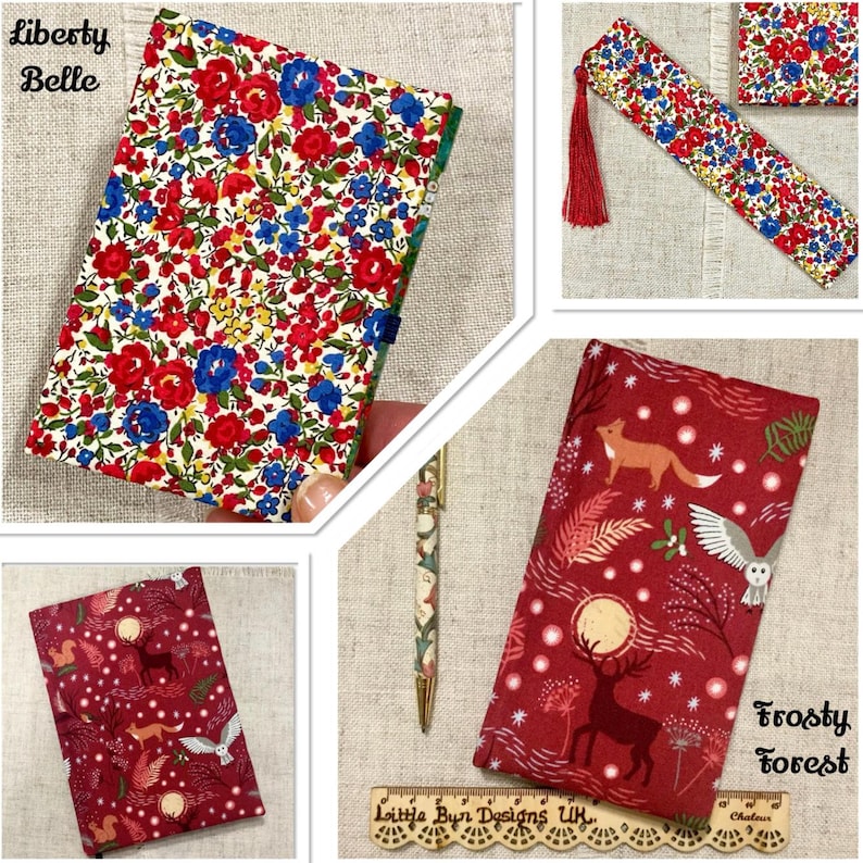 Op de afbeelding: Een stoffen boekomslag met bloemenpatroon gelabeld Liberty Belle, een bijpassende bladwijzer met rode kwast en een stoffen boekomslag met bosdierenprint gelabeld Frosty Forest, vergezeld door een bijpassende pen en liniaal.