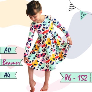 May include: A young girl wearing a colourful long-sleeved dress with a leopard print and abstract shapes. The dress has a white background with blue, yellow, red, and pink accents. The dress is available in sizes 86-152.