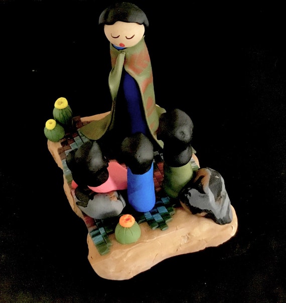 Storyteller on Wood Base