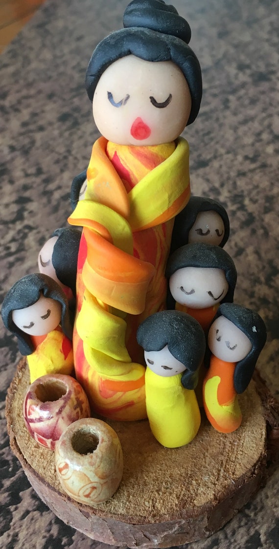 Storyteller with Seven Grandchildren in Polymer Clay on Wood Base