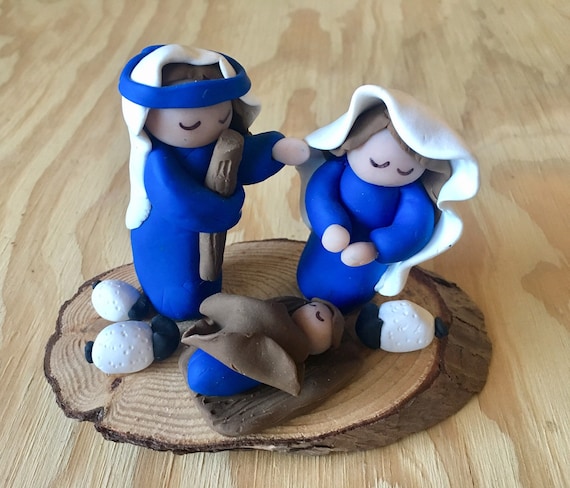 Blue and White Clay Nativity on Wood Base