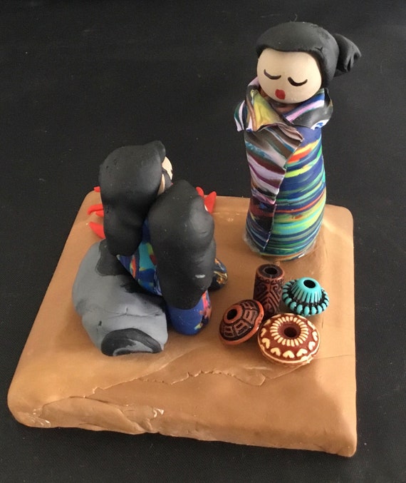 Storyteller Multicolor on Wood Base