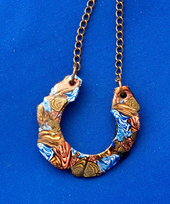 Handcrafted Polymer Clay Horseshoe Shape Pendant