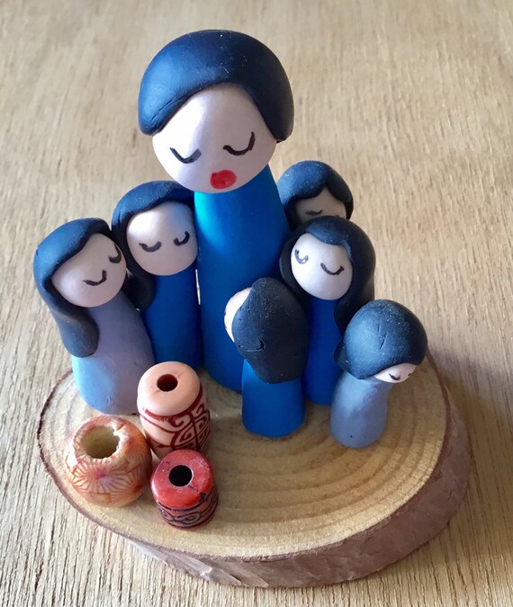 Storyteller in Gray/Blue on Wood Base