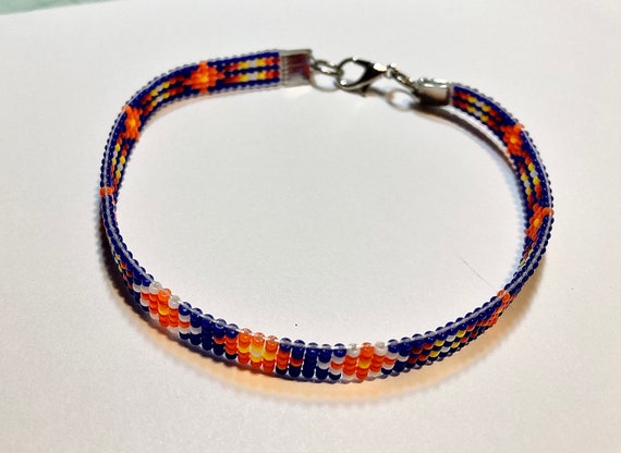 Blue Background Narrow Loom Beaded Bracelet