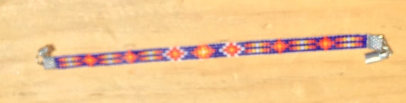 Blue Background Narrow Loom Beaded Bracelet