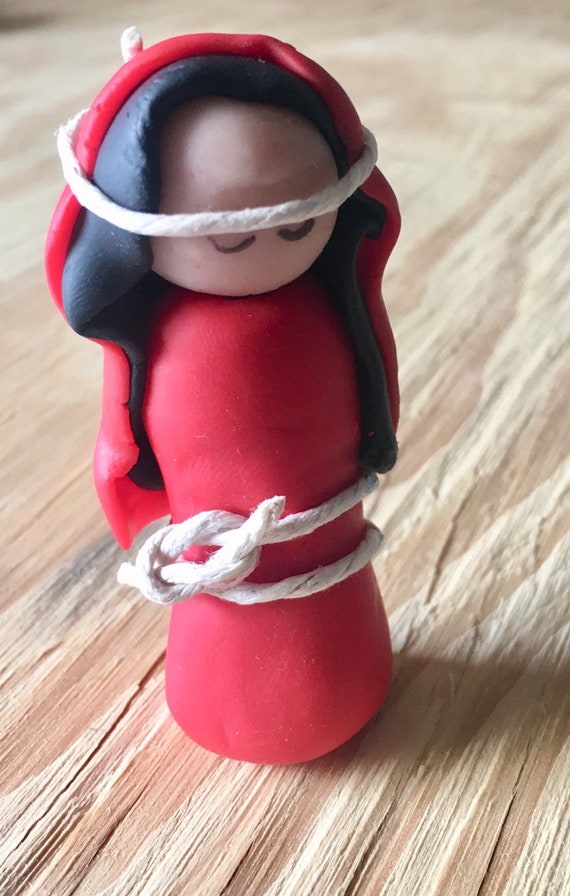 Red Joseph Nativity Figurine