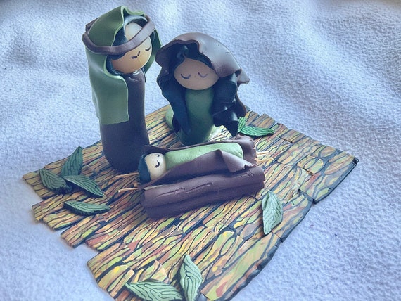 Nativity in Green and Brown Polymer Clay on Polymer Clay Wood Look Floor