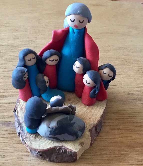 Storyteller in Blue/Red on Wood Base