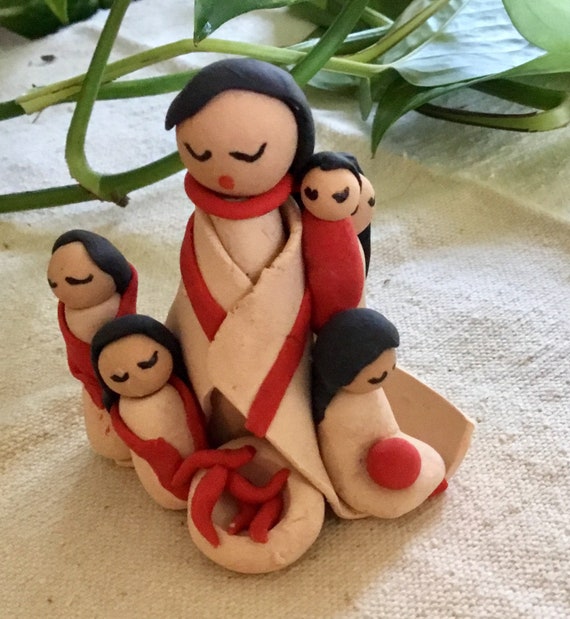 Red and Beige Native American Storyteller Figurine