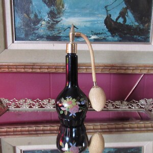 Vintage Black Perfume Bottle With Atomizer Adorned With Flowers