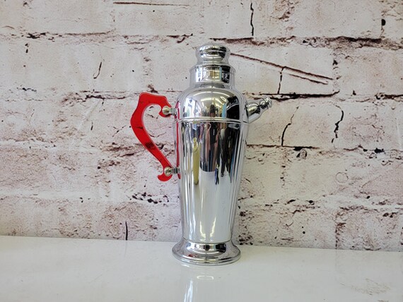 Art Deco Chrome Cocktail Shaker With Molded Columns & Red Lucite