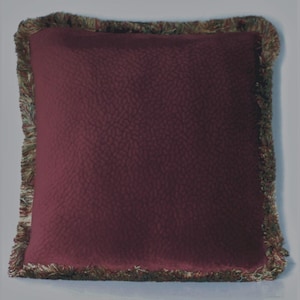 burgundy red textured solid velvet throw pillow with gold fringe for sofa chair or couch square