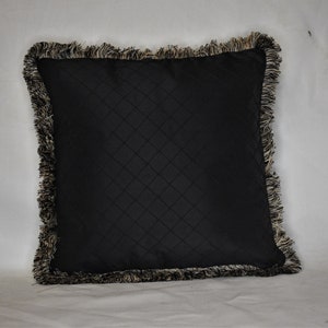 black/gold silk decorative throw pillow with fringe and insert