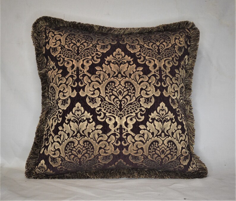 Solid brown chenille throw pillow with goldbrown brush fringe