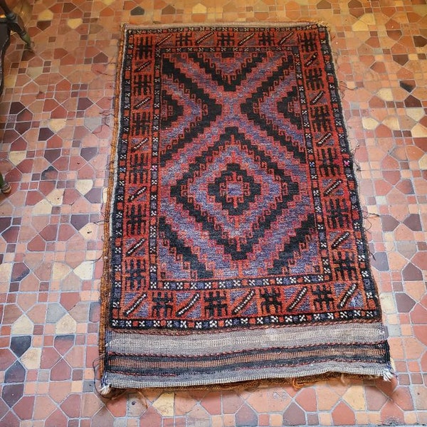 Antique Baluch Balistch (Pillow Bag), 25"x42",  D0216, blue and indigo, antique Shamanic symbols. Still has kilim back  attached