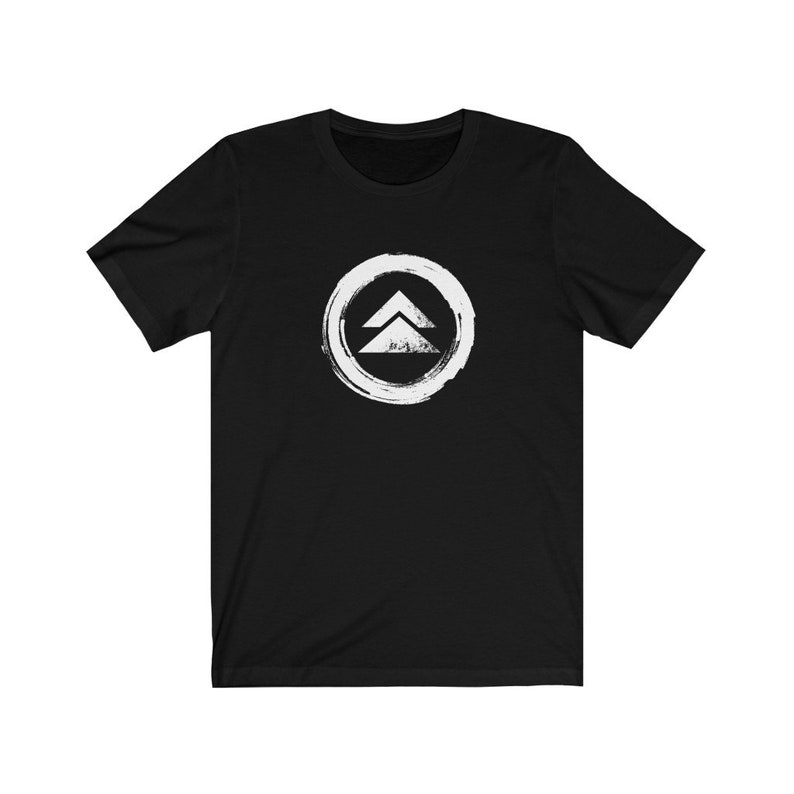 May include: Black t-shirt with a white graphic of a stylized symbol with two triangles inside a circle.