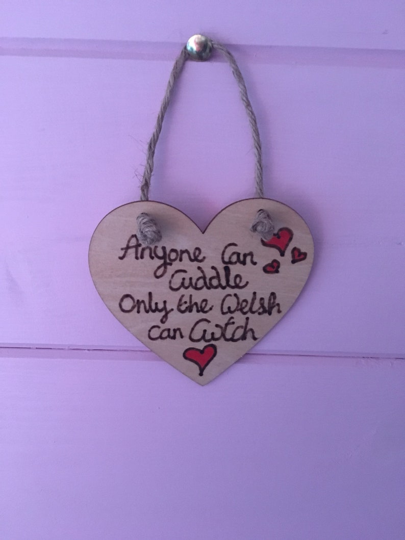Anyone can cuddle only the welsh can Cwtch with hearts wooden hanging hearts