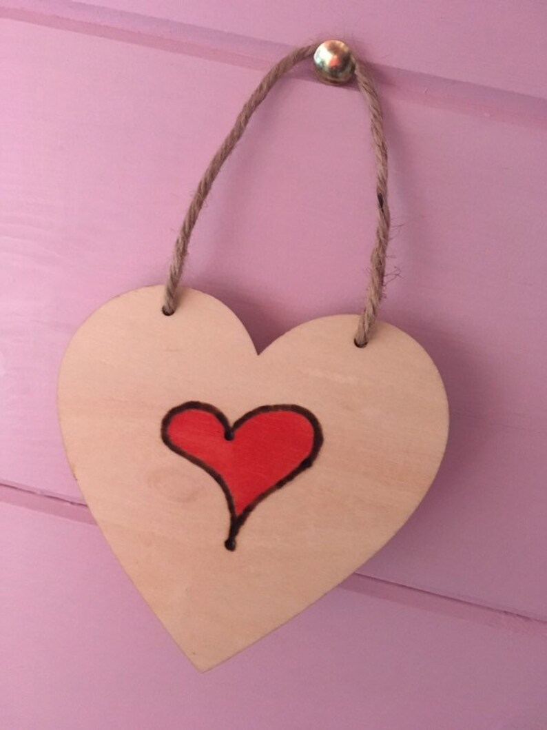 Anyone can cuddle only the welsh can Cwtch with hearts wooden hanging hearts