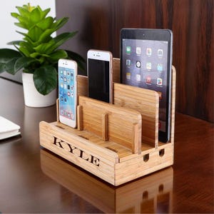 a personalized wood docking station for phone, wallet, tablet