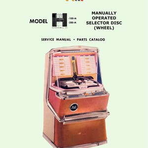 Könnte beinhalten: Ein vintage rosafarbener und weißer AMI Modell H Jukebox mit einem schwarzen Plattenspieler und silbernen Verzierungen. Der Jukebox hat ein Servicehandbuch und einen Teilekatalog.