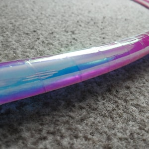 Translucent Moon Performance Polypro Hula Hoop coated with protective tape