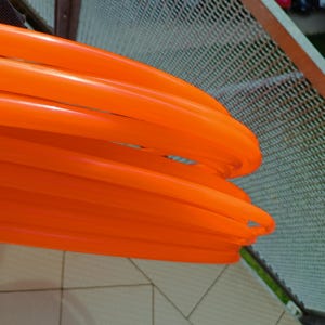 Hula Hoop plegable de polipropileno naranja solar radiactivo de 5/8" y 3/4"