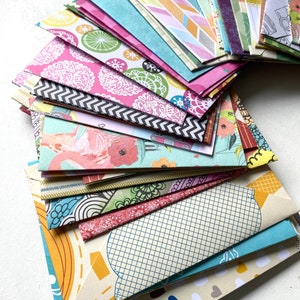 Assorted envelopes  bright , patterned  handmade envelopes , pockets for journals , decorated assorted designs , gift packaging , snailmail