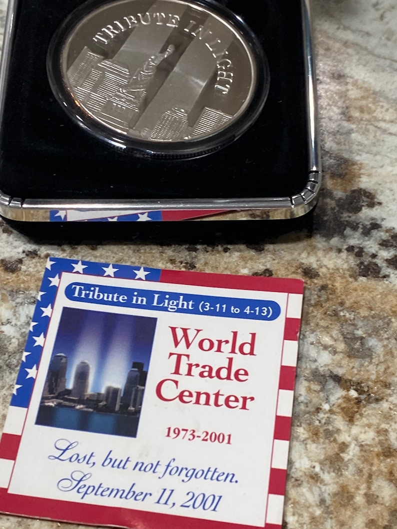 Rare shops limited edition coin Tribute to light 1troy ounce .999fine silver